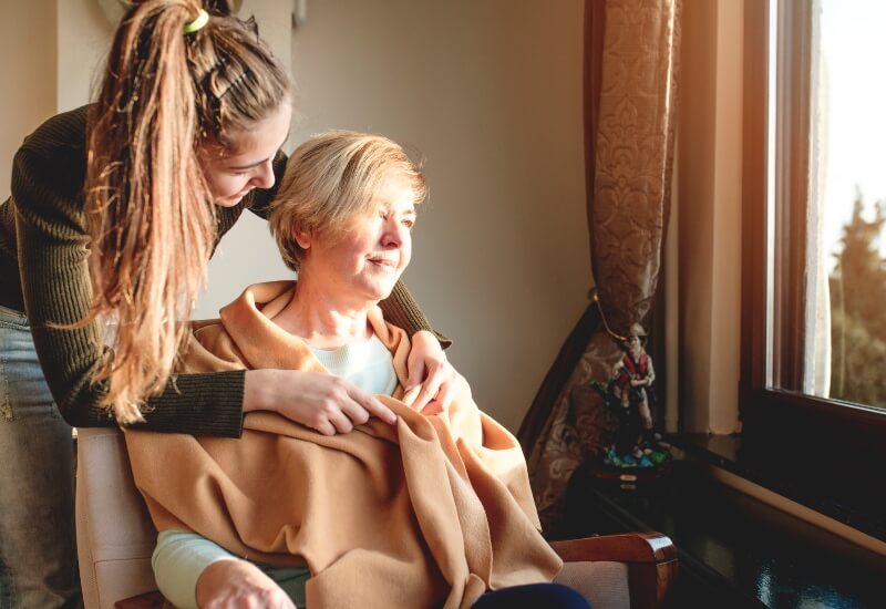 woman with end-stage Parkinson's Disease and hospice nurse