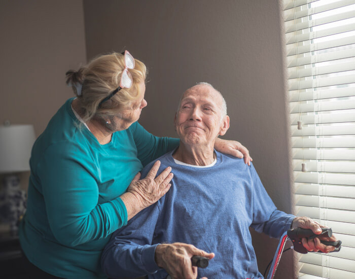 A hospice worked looking at an elderly man in Torrance, CA