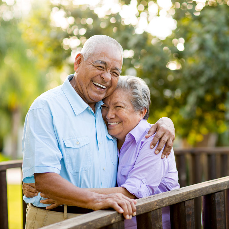 elderly couple smiling