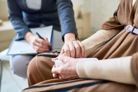 A woman in grief counseling after the loss of her loved on