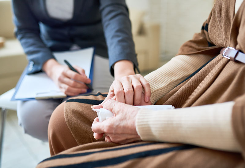 A woman in grief counseling after the loss of her loved on