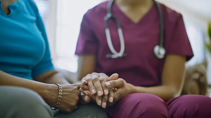 Agape hospice nurse visiting with patient in Lawndale, CA