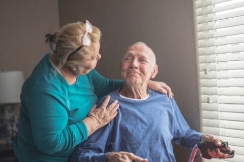 Senior receiving support at home with mobility assistance in Orange and LA Counties