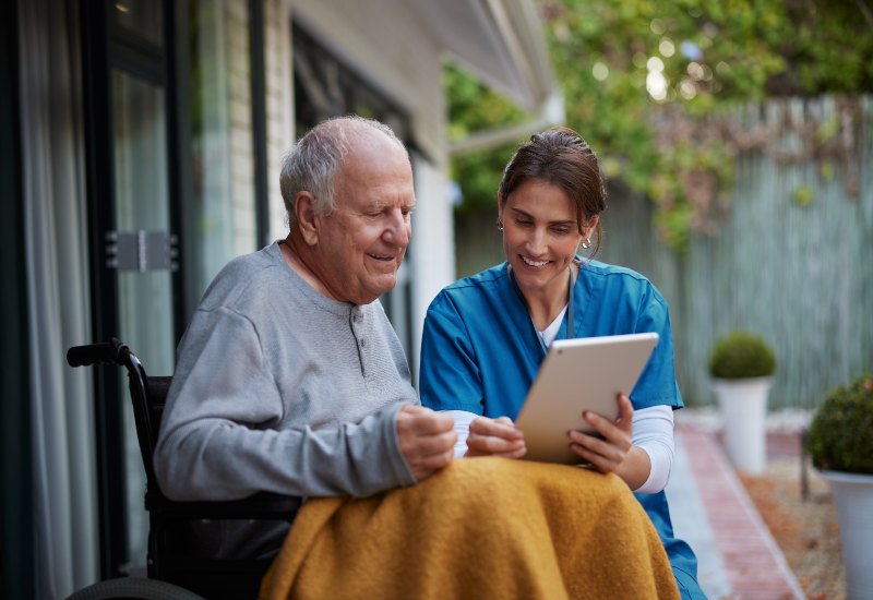 Hospice care provider reviewing information with a stroke patient in Los Angeles & Orange Counties